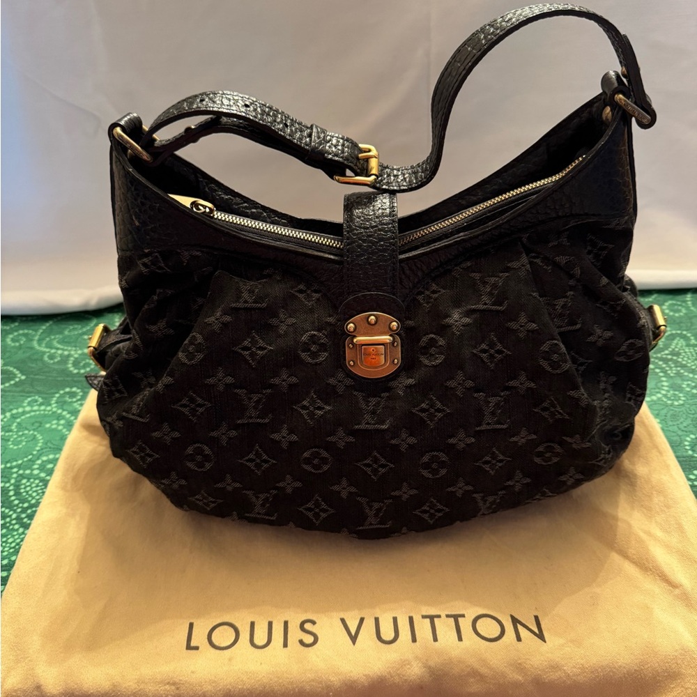 Louis Vuitton Black Quilted Shoulder Bag with Gold Accents. Includes dust bag.
